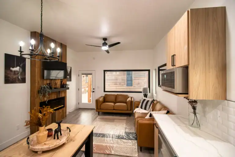 Interior view of a modern tiny home with cozy living space and stylish decor.