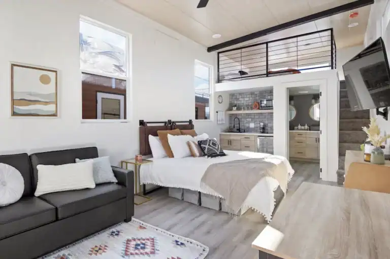 Interior of a Zip Kit home with living area and bedroom.