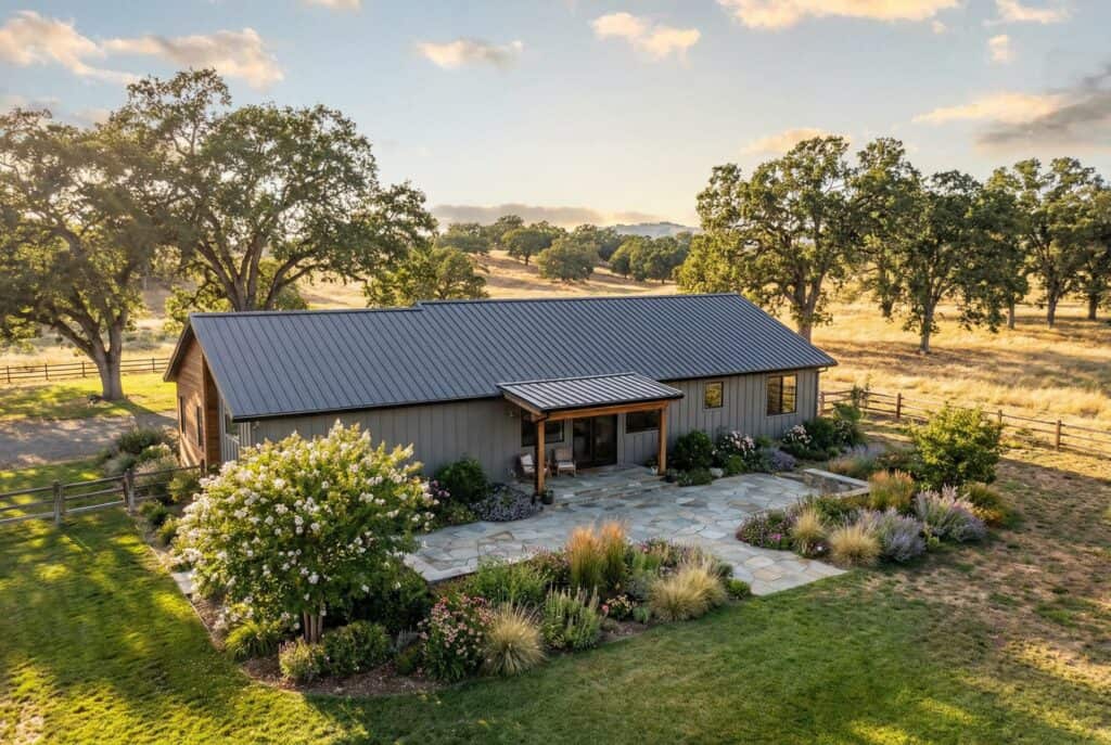 Modern Birch Zip Kit Home with metal roof and landscaped yard.