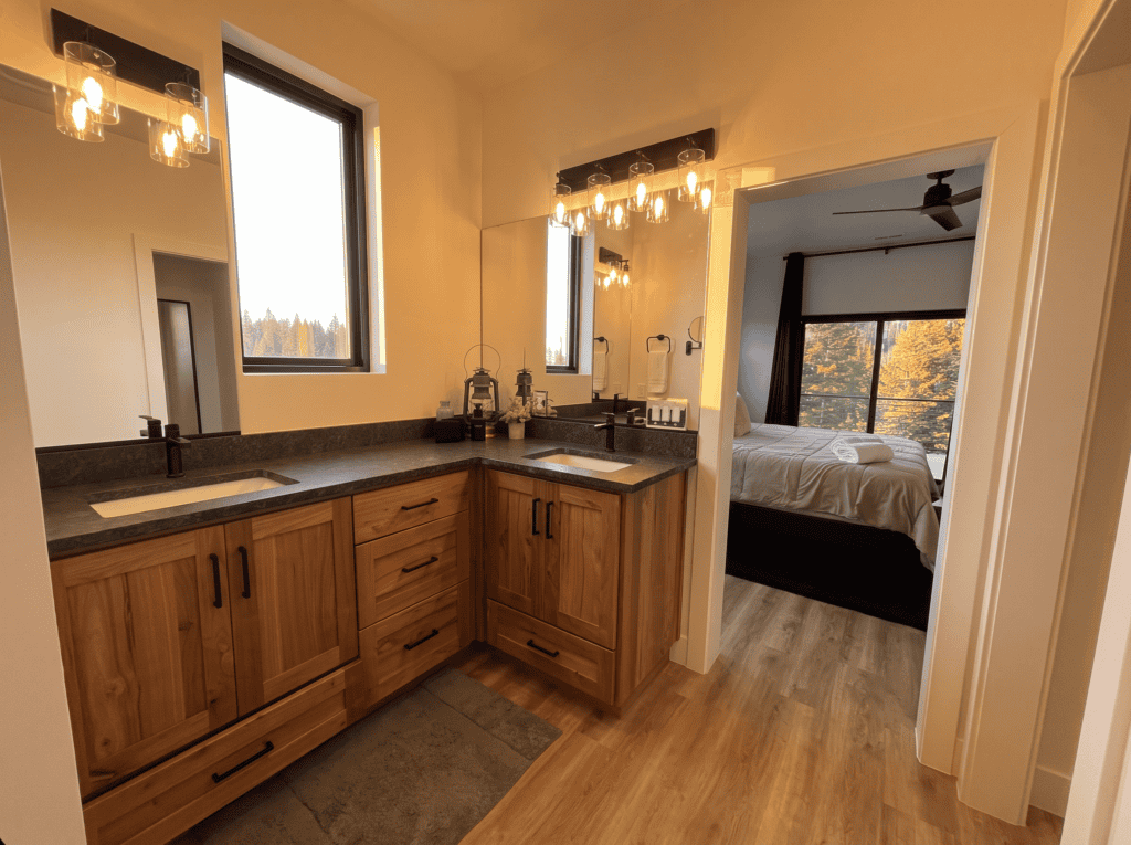 Contemporary bathroom with wooden cabinetry and large windows for natural light.